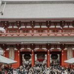 Bustling crowd gathers at Senso-ji Temple, Tokyo's famous historic site.