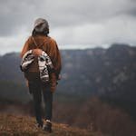 Woman exploring the mountains in Manresa, Spain, capturing the essence of wanderlust and nature. - Solo Travel