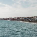 Why We Chose Kyoto First and Still Plan to Visit Rome 3 Explore the serene coastline of Rome, Italy with tranquil seawater and beachside scenery.