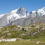Switzerland vs. Austria: Alps on a Budget 4 Stunning snowcapped mountains in La Grave, France, showcasing rugged natural beauty and alpine scenery.
